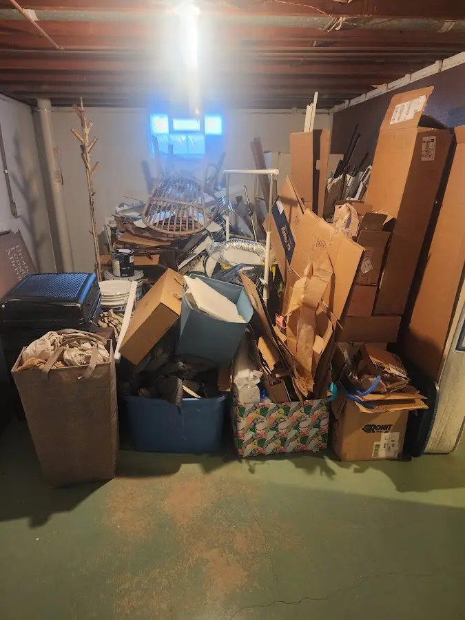 Roll-off dumpster container at job site for 2 Yard Dumpster Rental in Highland Falls